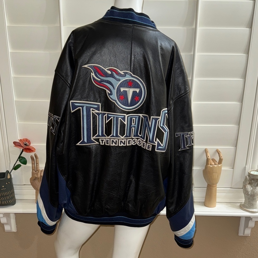 G III Carl Banks Tennessee Titans Black and Blue Leather Jacket